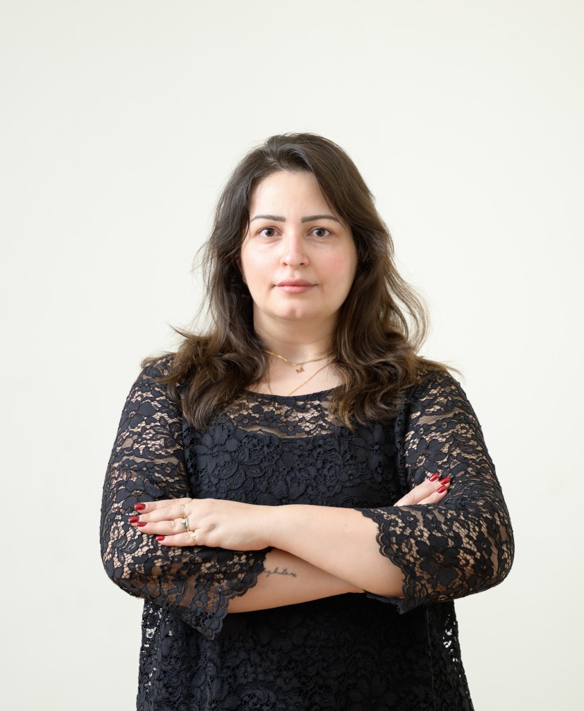 Mariam Victor, a digital marketing manager, posing outdoors with a confident and thoughtful expression.